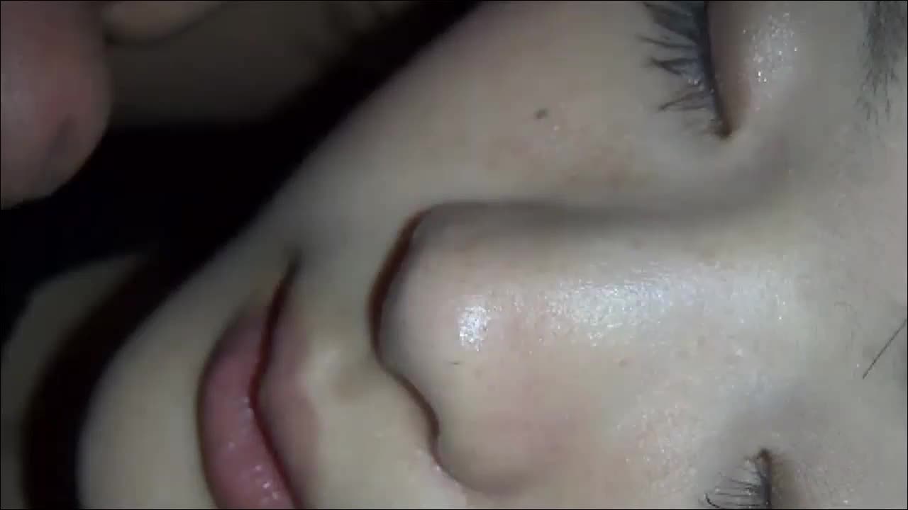Rubbing his dick on a sleeping Asian girls lips