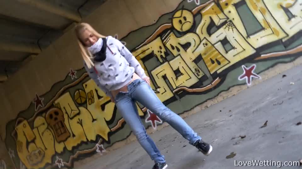 Violeta Wets Her Jeans Under A Bridge