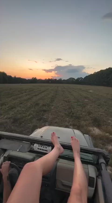 Actress Hassie Harrison rides shotgun with her pedicured bare feet on full display