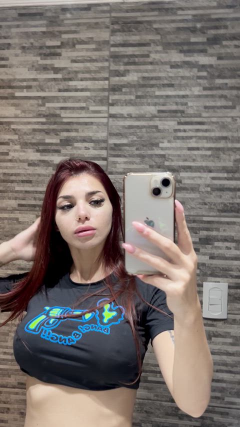 My friends often say, "Your tits aren't even that big," but they don't realize how big my redhead tits are until I reveal them