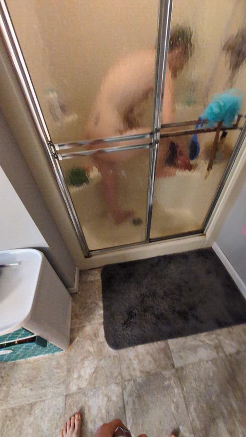 You can watch me shower only if the cage stays on