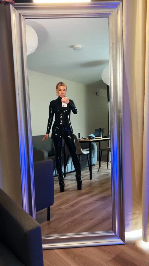 Latex queen walks in all eyes obey her rule