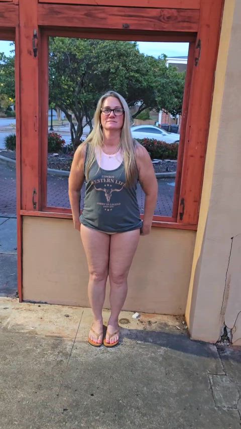 Your favorite horny mom letting the kitty out downtown!