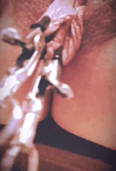 Long meaty labia stretched with weights