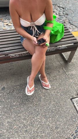 Hanging out on the street with a skimpy outfit and my flip flops. I wonder who was staring at my feet? thumbnail