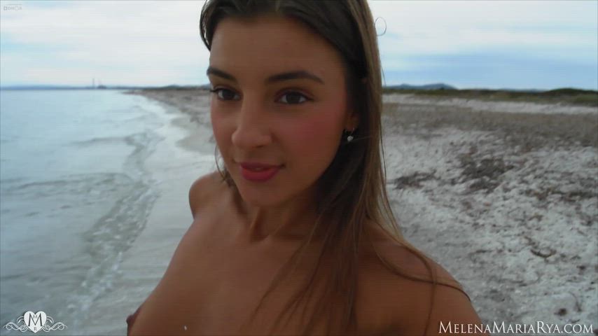 She Takes Selfies on the Seashore