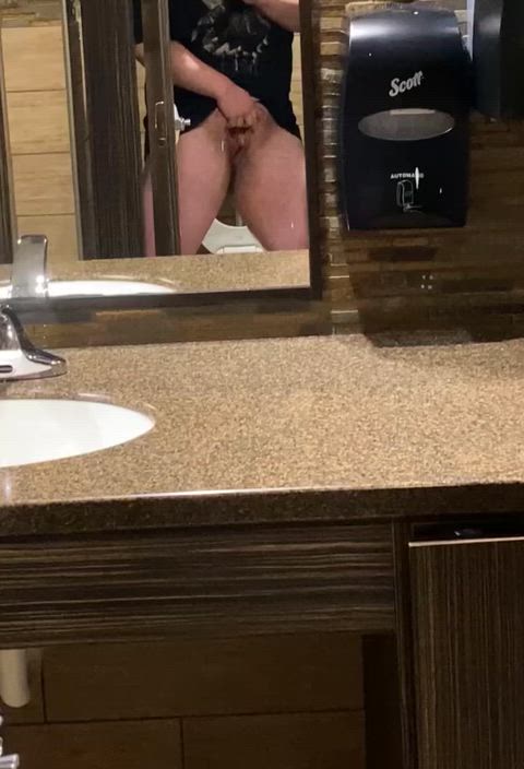 Risky orgasm in public bathroom