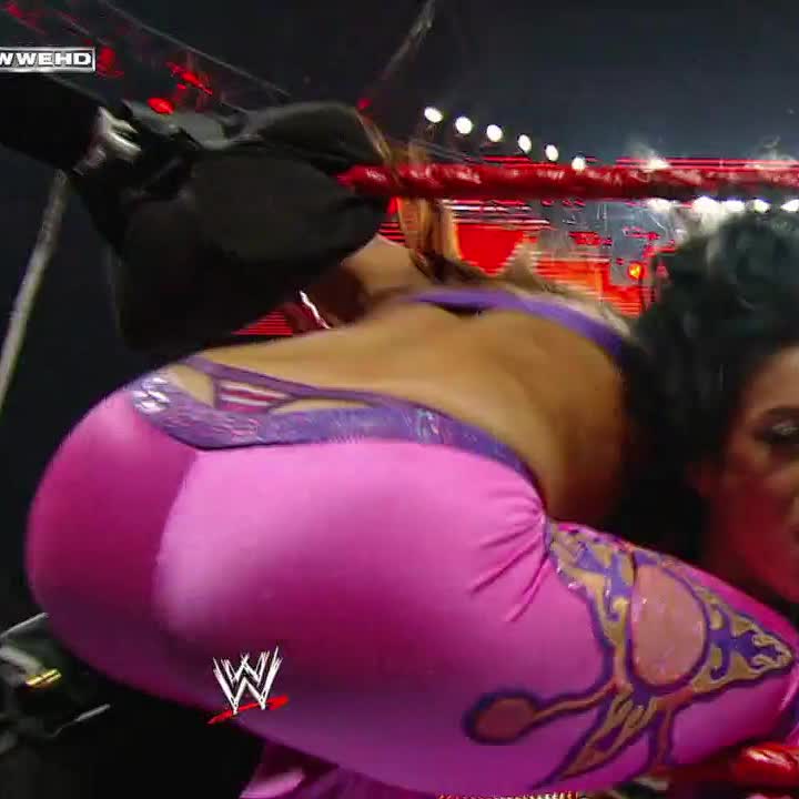 Mickie James and her big ass and thong slips.