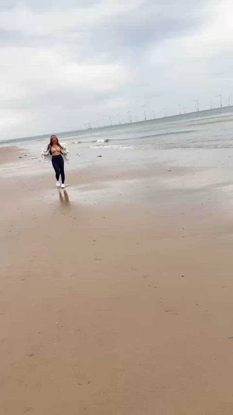 Just innocently scrolling my phone on the beach…topless