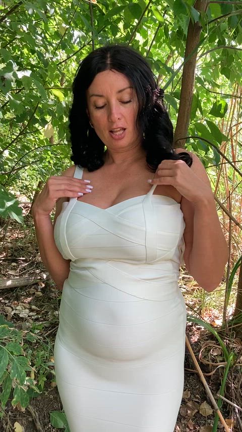 Mommy flashing outdoors