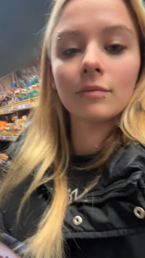 The store is a great place to show off my nude photos, it's just a shame that the men behind me can't see them