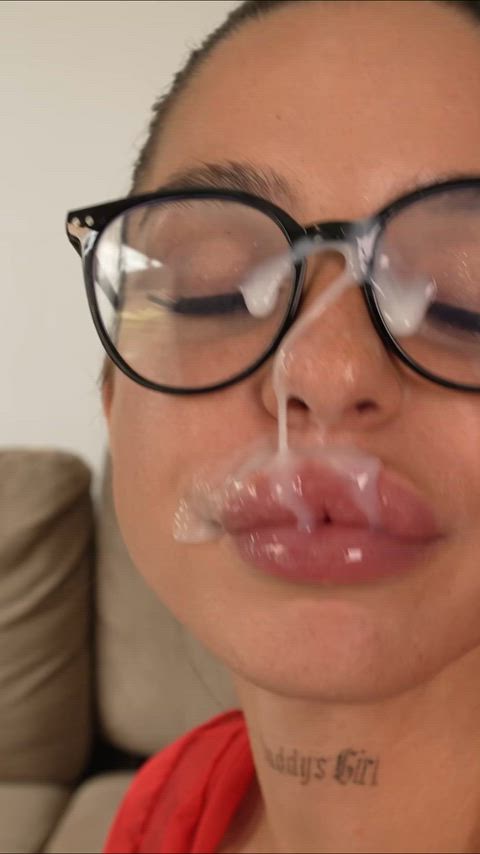 A good girl is ready to get a lot of cream on her face