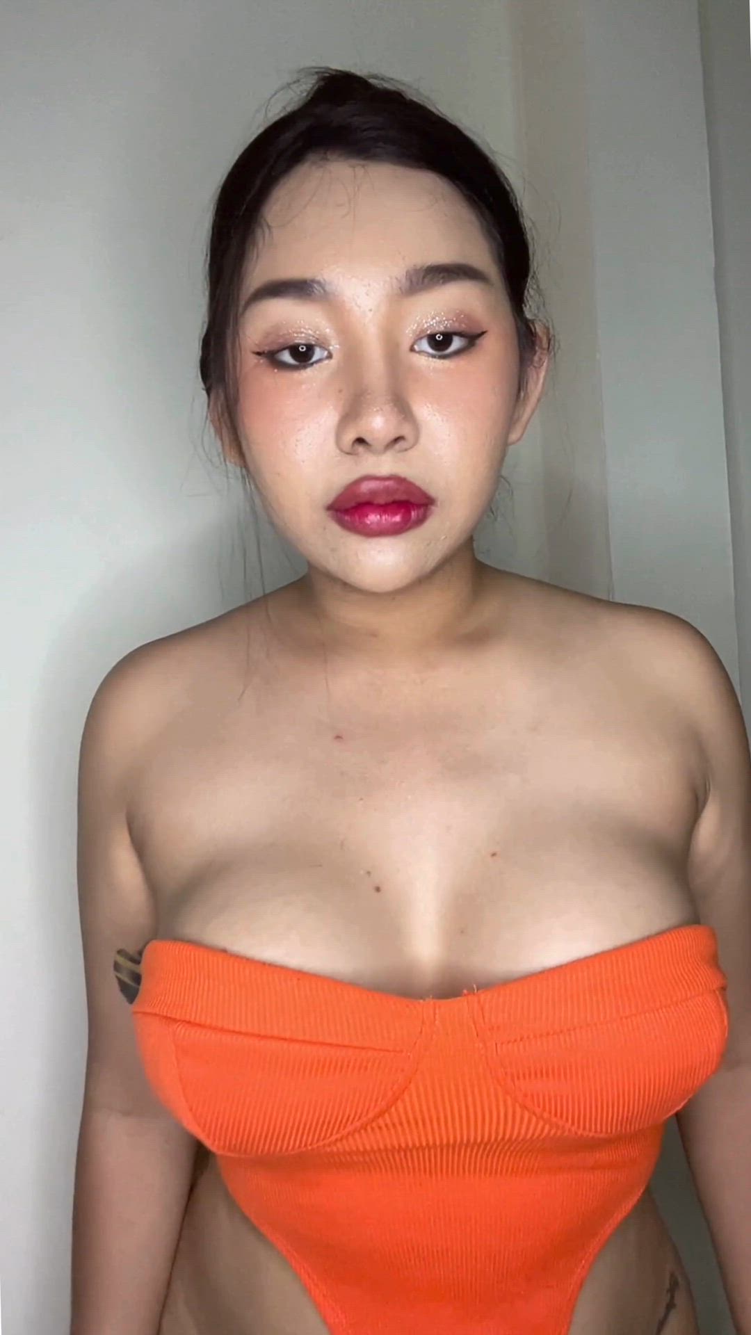 A pretty Asian busty reveal just for you