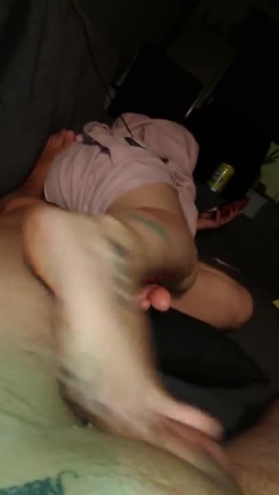 Pleasing him while distracted on her phone