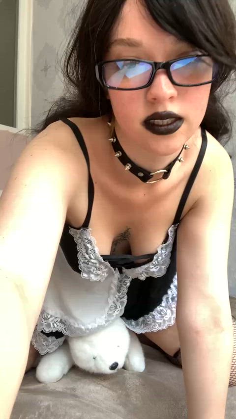 Goth maid riding a... polar bear?