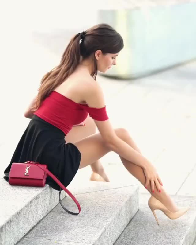caressing her silken legs