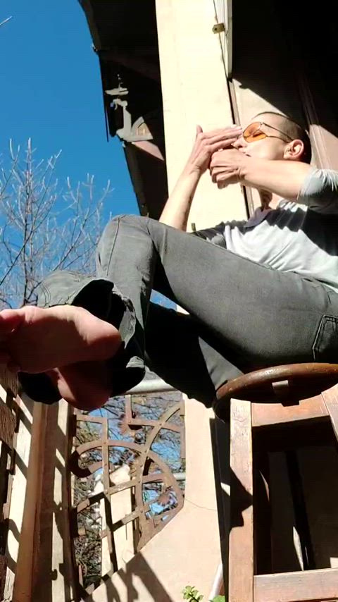 Relaxed smoking on the balcony thumbnail