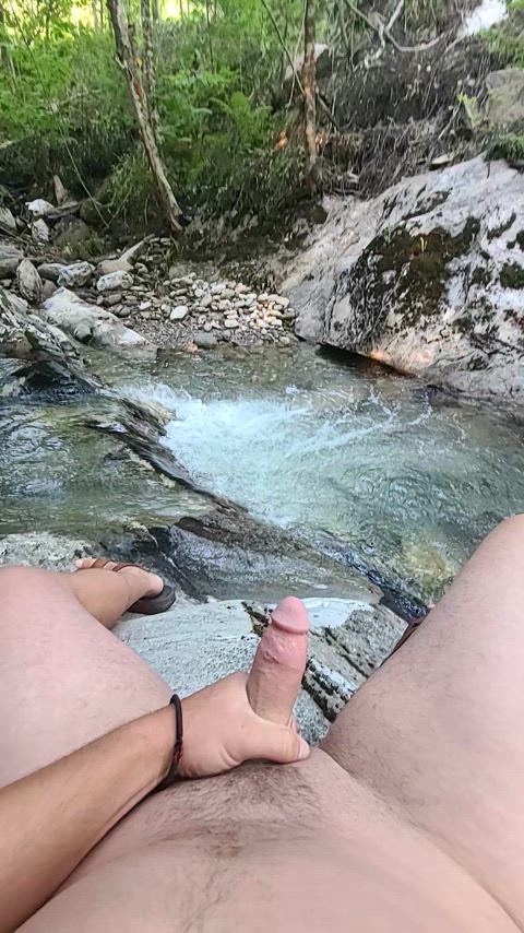 By the river