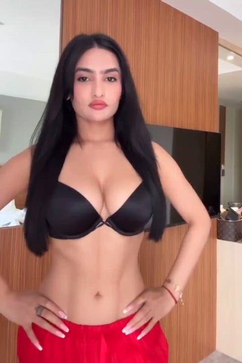 Poonam Sharma in a black bra and red pants