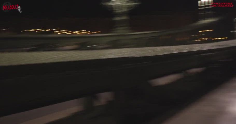 Friends in Public on a Bridge Between Passersby