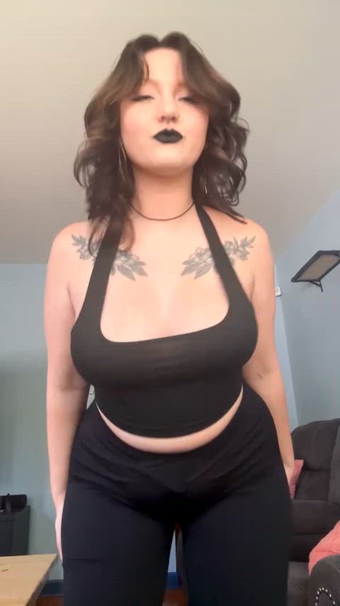 Big tiddy goth Mommy wearing a low-cut tight shirt ;)