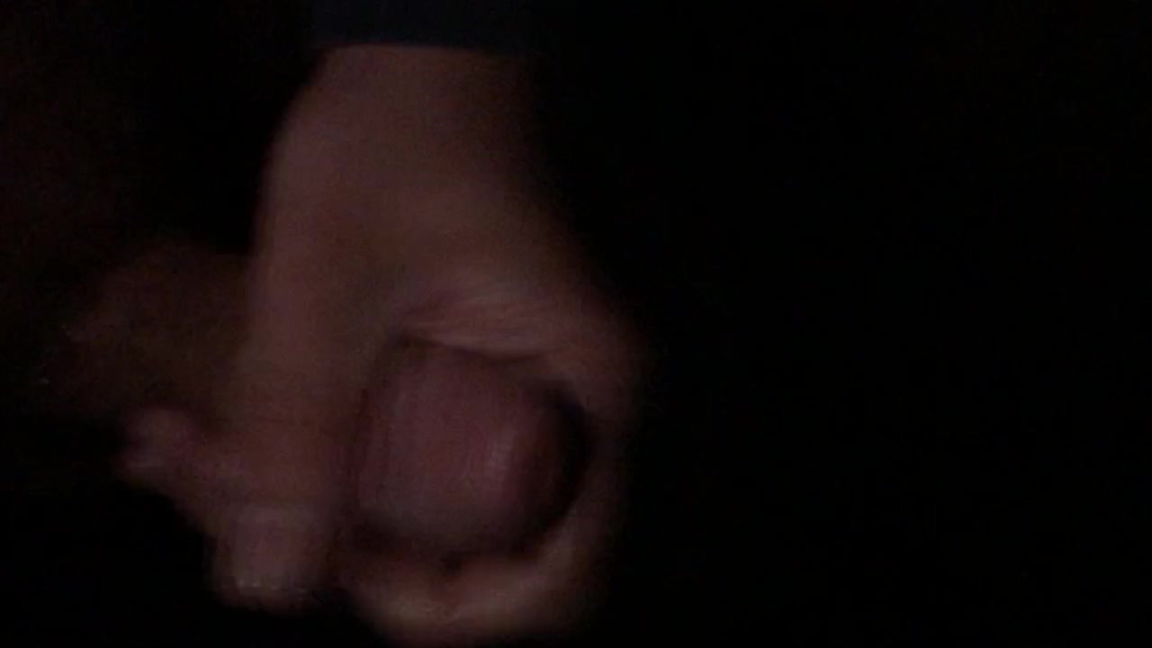 Cum while in the dark holding a light against your cock