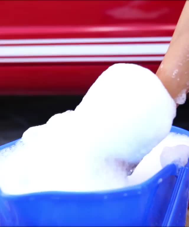 Lindsey Pelas car wash