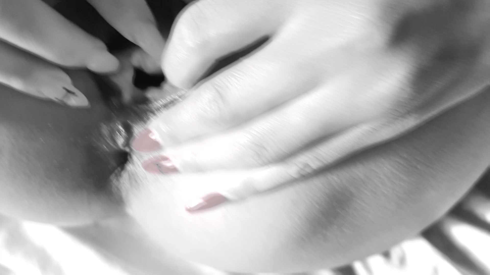 Opening up her labia