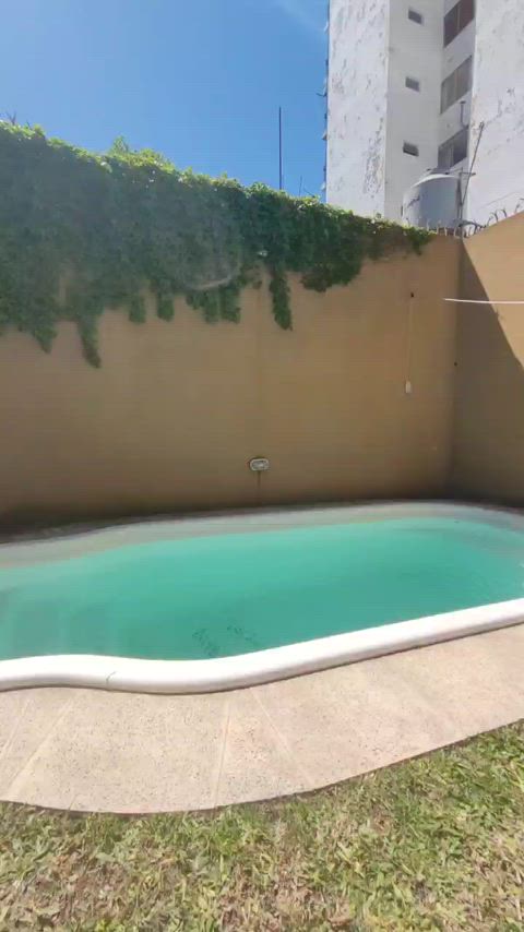 I'm a naked doll in my pool but I don't dare swim alone.