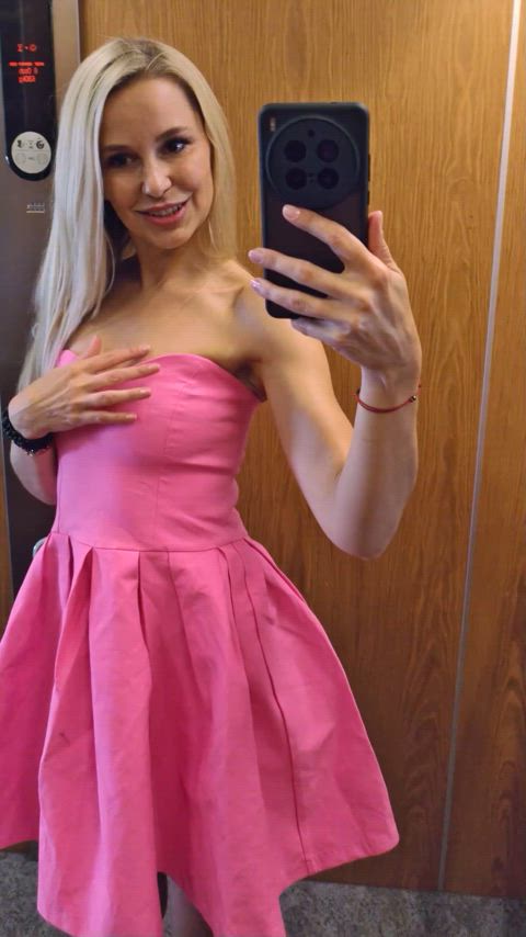 While going down the elevator to the parking lot, I decided to play with my breasts a little bit