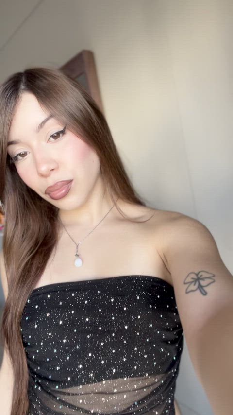 Little Asian girl showing off her boobs