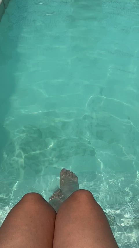 Enjoying the pool while the neighbors spy