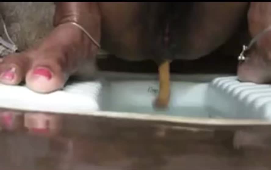 VERY backed up Indian woman unleashes torrents into lucky squat toilet