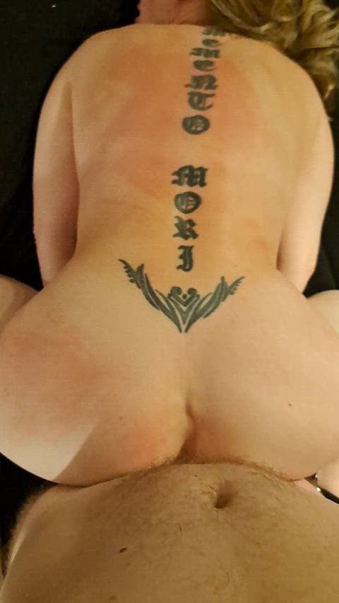 Submissive wife flogged while locked to a spreadbar