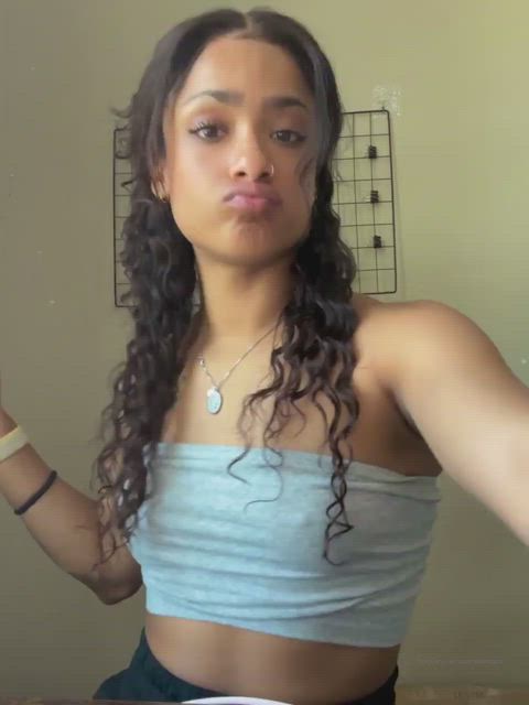 Petite pretty girl showing her tits