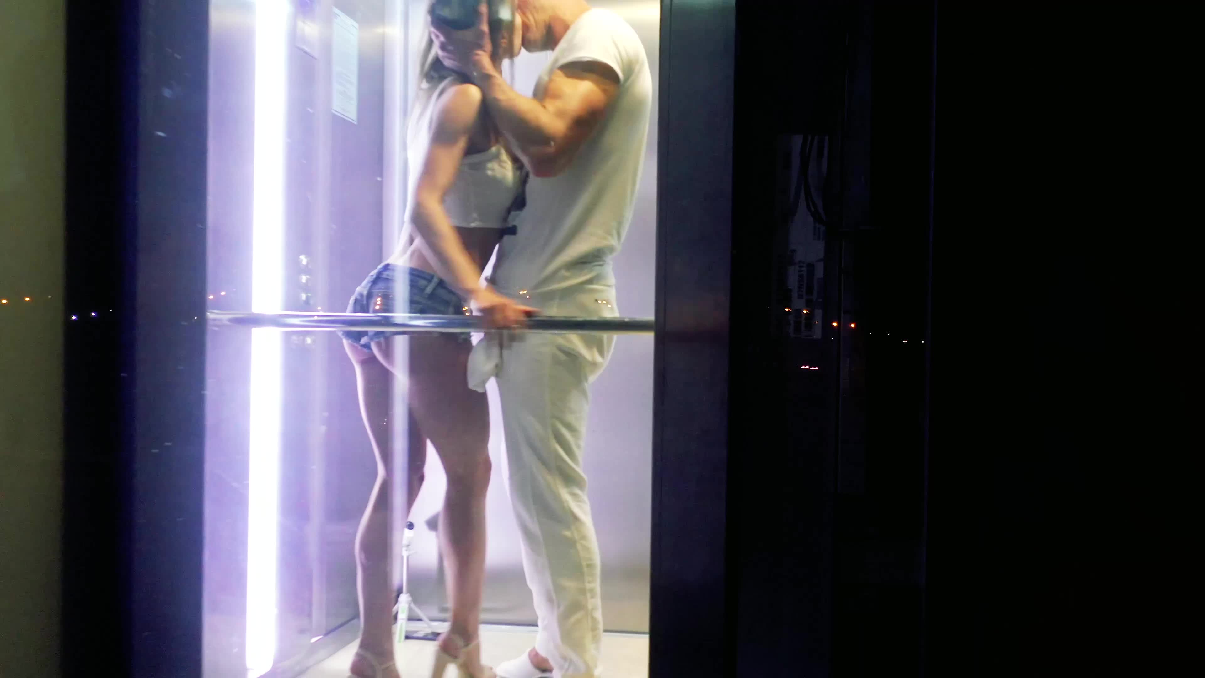 Rough public fuck in the elevator shooted by spectators and drone