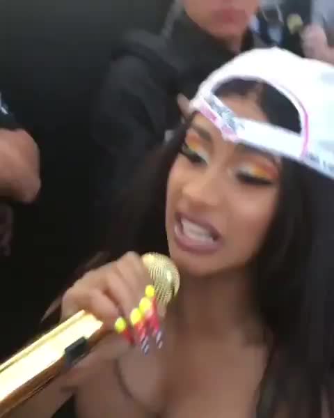 Cardi B and her boobs performing
