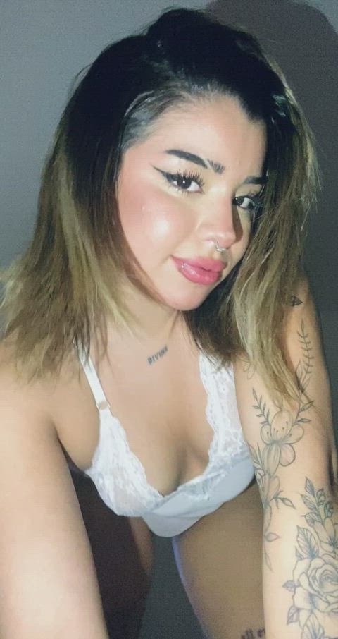 Getting her hair out of the way