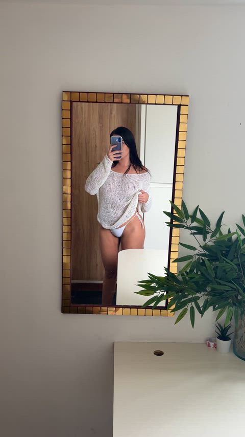 Getting ready for a quick errand braless