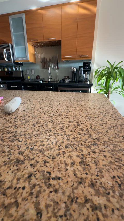 My neighbor watching me clean my table.