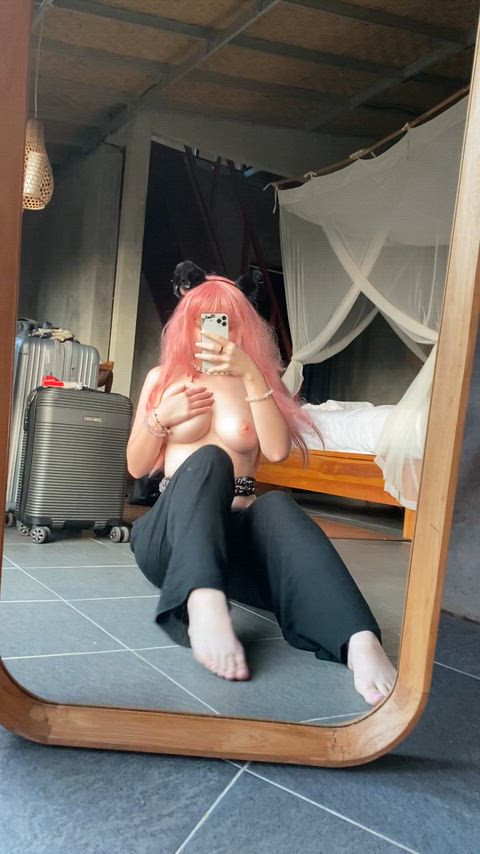 Pink hair, pink nipples...but black pants? Idk