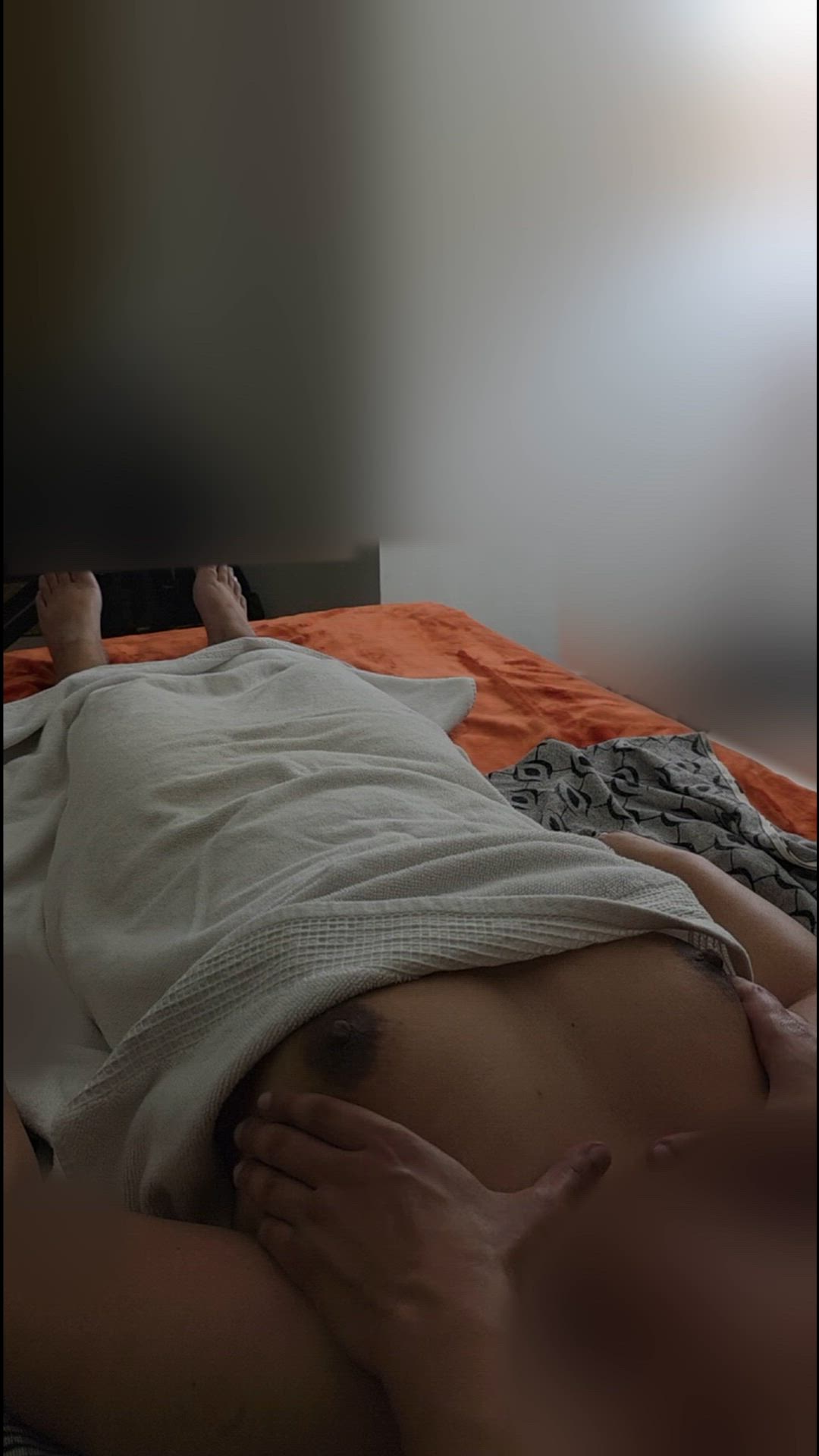 My hands sliding over her tits while I massage her