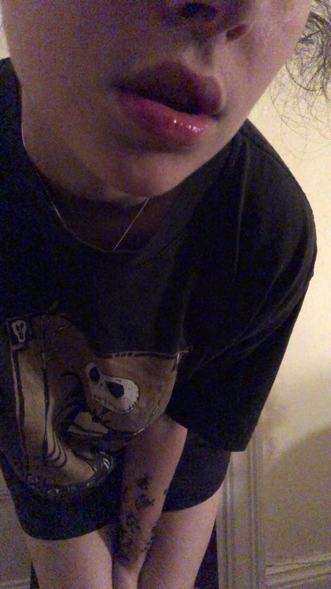 Underneath an oversized t-shirt