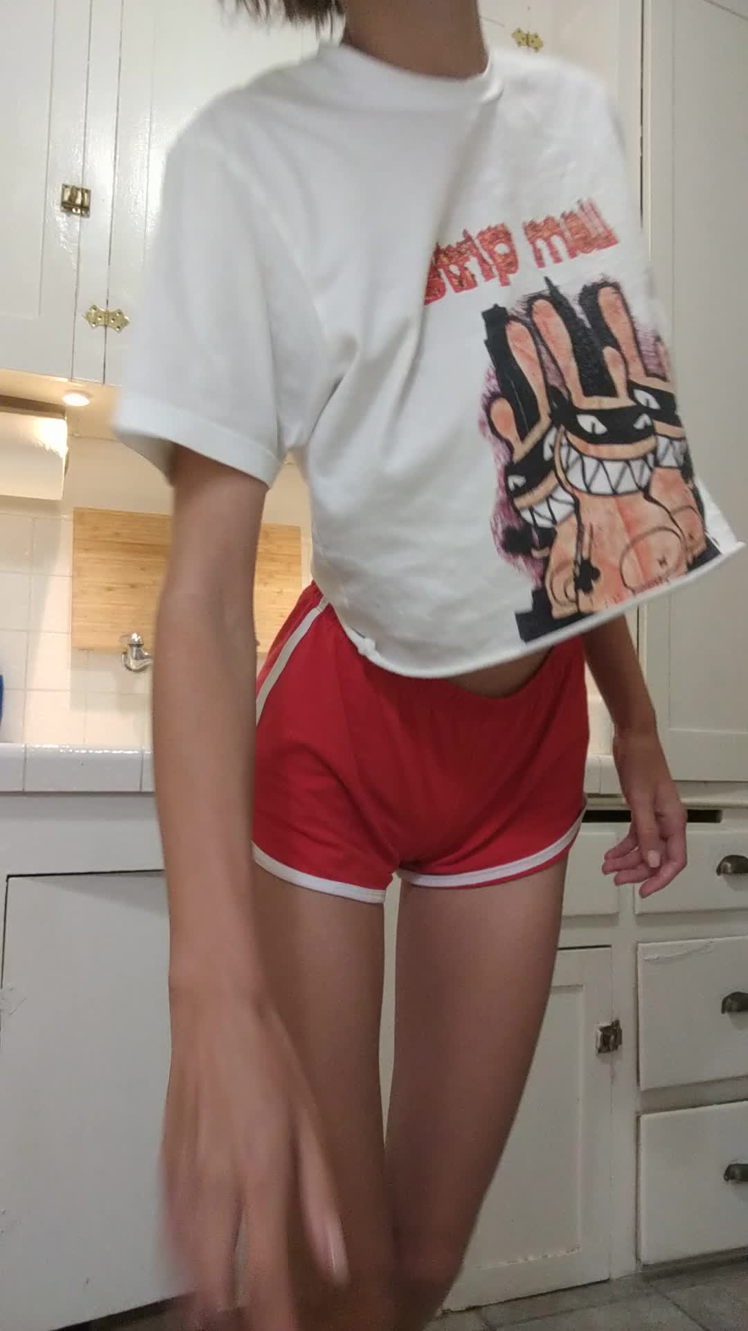 Woman with a perfect body changing outfits