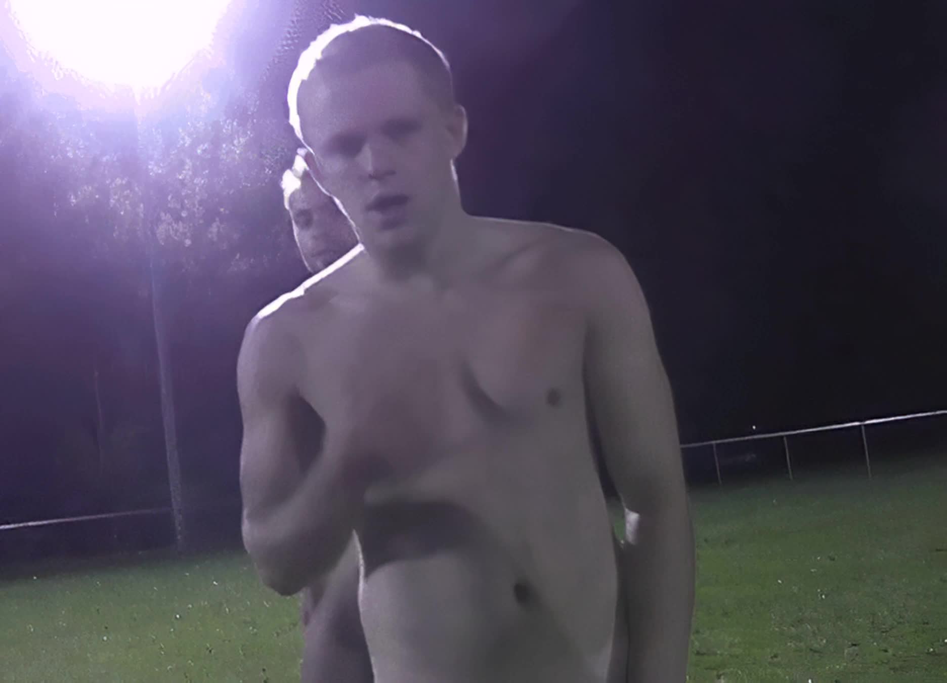SHU Rugby club player teasing camera during shooting of naked calendar