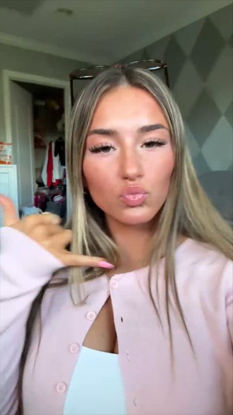 That cardigan can't hide her