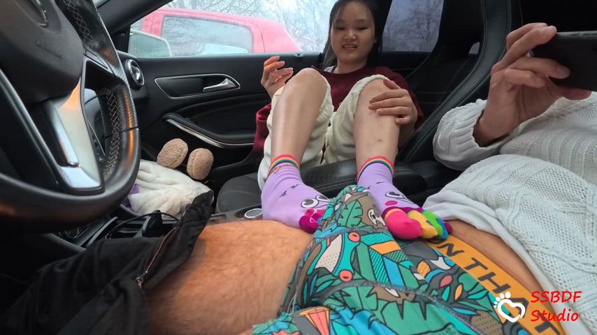 19 yo petite Asian teen gives awesome handjob and footjob in car w cumshot