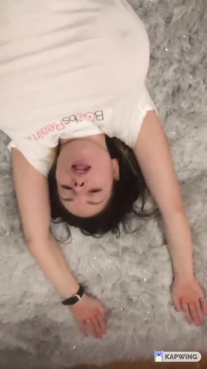 Talia rolling around on the ground