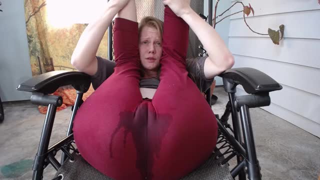 Redhead pissing red pants - Anyone know who she is?