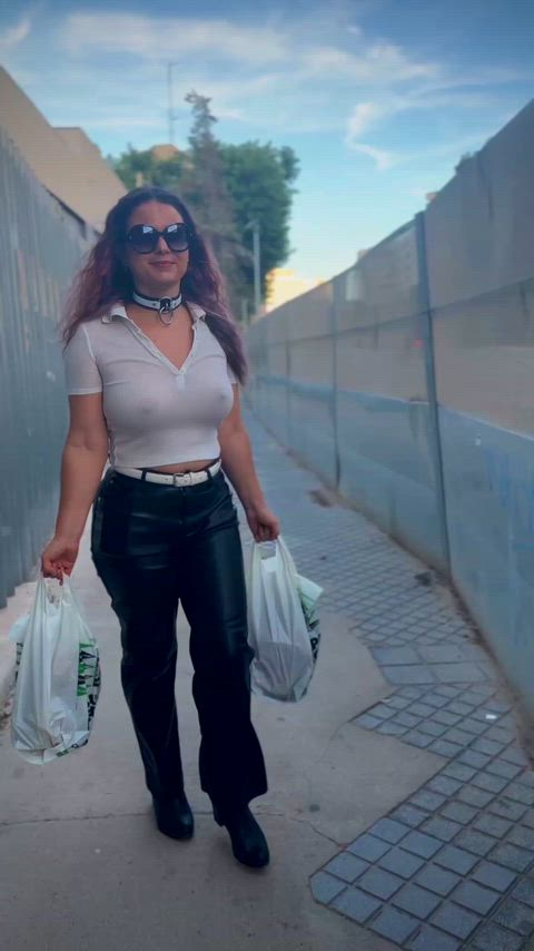 Going home from the supermarket.  My hands are full, & so is my top!